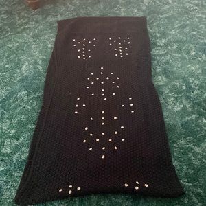 Black infinity scarf with silver studs.